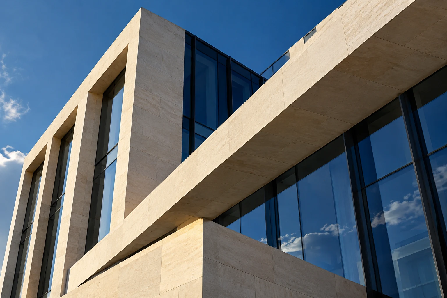 Modern glass and stone business architecture in warm afternoon light